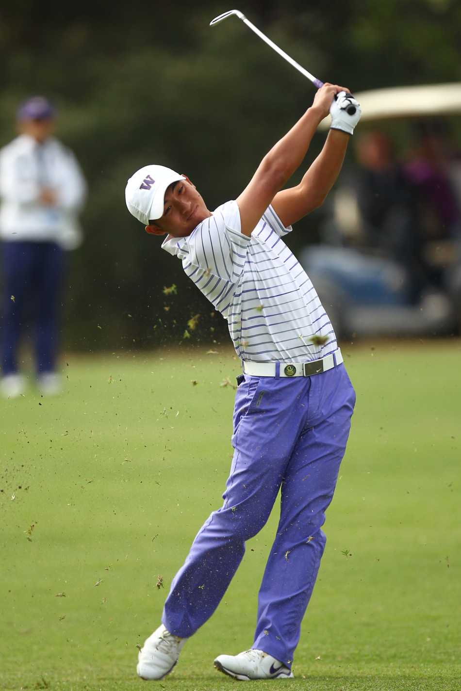 刘晏玮在比赛中全神贯注地推杆，周遭世界仿佛寂静，只有球、球洞与他坚定的意志