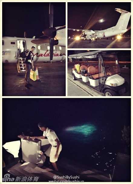 丁彦雨航与昔日队友比斯利在场边轻松合影，两人对着镜头露出搞怪而灿烂的笑容